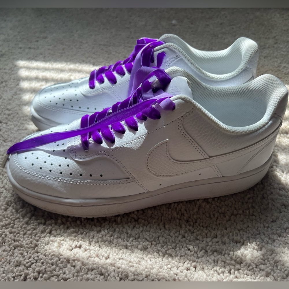 White Nike shoes *also with white laces*